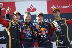 From left: Kimi Raikkonen (2nd), Red Bull engineer, Sebastian Vettel (German GP winner) and third placed Romain Grosjean also of Lotus on podium on Sunday. A Pirelli photo