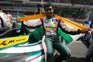 Karun Chandhok poses with an Indian flag. An Adrenna image