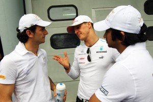 Schumy with HRT drivers Narain Karthikeyan (right) and Pedro De la Rosa at Sepang on March 25, 2012. HRT photo