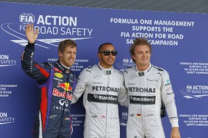 Lewis Hamilton of Mercedes AMG Petronas flanked by teammate Nico Rosberg (to his left) and Sebastian Vettel of Red Bull after taking the Silverstone pole on Saturday. An FIA photo