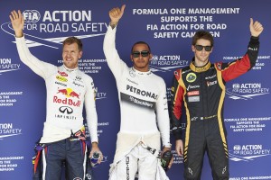 Hamilton takes pole ahead of Sebastian Vettel (left) and third placed Romain Grosjean, who is expected to have a better grip of tyres on race day. A M