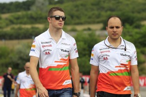 Paul di Resta of Sahara Force India (left) with an engineer at Nurburgring on Thursday. An FIA photo