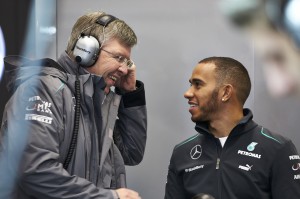 File photo of Lewis Hamilton (right) with team boss Ross Brawn. Photo by Mercedes AMG Petronas F1 team.