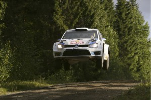 Sebastian Ogier and co-driver Julien Ingrassia take a jump on the second day of Rally of Finland on Friday. A VW photo