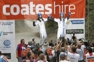 Sebastian Ogier and co-driver Ingrassia of Volkswagen who won Rally Australia speak to the media from the podium. A Volkswagen photo