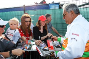 Sahara Force India team principal Vijay Mallya obliges fans at a race this year. File photo by Sahara Force India F1 team.