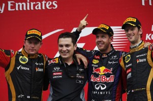 Korean GP podium shota; From Left: Kimi Raikkonen, Lotus F1, 2nd position, Tim Maylon, Performance Engineer, Red Bull Racing, Sebastian Vettel, Red Bull Racing, 1st position, and Romain Grosjean, Lotus F1, 3rd position, on Lotus F1 team photo by Charles Coates/LAT 