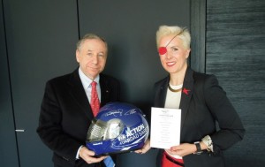 Maria Villota with Jean Todt in May 2013. File Photo by media team of Villota