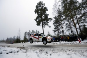 A WRC participant flying through the snow in Rally Sweden. An FIA photo