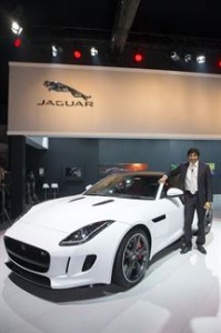 Narain with Jaguar F-Type coupe at the Delhi motorshow on Wednesday. A TVC photo