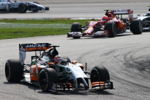 Hulkenberg wards off Alonso, only for a brief while, at Sepang on Sunday. The Sahara Force India driver finished 5th. A Sat File photo from Sahara Force India 