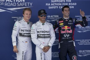 Hamilton (centre) flanked by Nico Rosberg on his right and Daniel Ricciardo after taking Spanish GP pole. A Mercedes AMG Petronas image