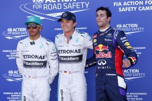 Nico Rosberg poses with teammate Hamilton and Ricciardo of Red Bull (right) after taking the Monaco pole. A Mercedes AMG Petronas image