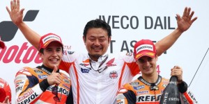 Marc Marquez of Repsol Honda (left) after his 8th win along with Pedrosa (irght) , third on podium on Saturday 28 June 2014. A Repsol Honda image