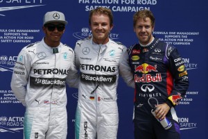Rosberg, flanked by Hamilton on right and Vettel on left after Canada GP qualies. Mercedes AMG Petronas team photo.