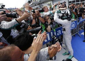 Mercedes team members pat Nico rosber after he won the Austrian GP on Sunday. A Mercedes  AMG Petronas team image