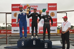 Advait, left, 2nd, Deodhar, 1st, Tarun Reddy, right, 3rd, Vikash Anand Sun at Coimbatore Round 3 of the Indian National Racing championship. An Adrenna image