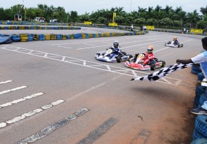 Ricky Donison (No. 27) takes the chequered flag inches ahead of Aaroh Ravindra in the Junior Max final of the JK Tyre Rotax Max Karting Nationals 2nd round at Hyderabad on Sunday. Image courtesy JK Tyre