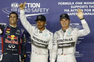 Hamilton (centre) takes pole position from teammate Nico Rosberg in Singapore. Daniel Ricciardo in a Red Bull (left) took P3. An AMG Mercedes Petronas image