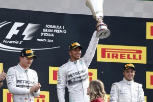 Hamilton with Monza trophy after winning the Italian GP ahead of teammate and championship leader Nico Rosberg on Sunday 7th Sept. 2014. A Mercedes AMG Petronas image