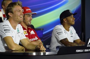 From left; Rosberg, Alonso and Hamilton at Thursday's press conference in Monza. An FIA image