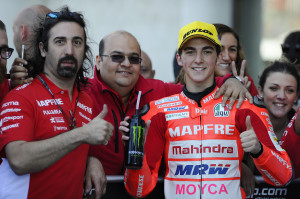 Francesco “Pecco” Bagnaia  celebrates with Mufaddal, CEO of Mahindra Racing. A Mahindra Racing Image.