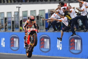 Marc Marquez celebrates as he takes the chequered flag on Sunday. A Repsol Honda image.