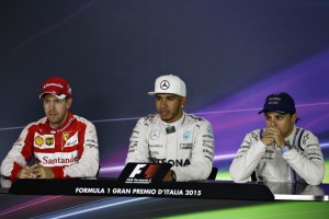 Hamilton (centre) address the press at the FIA Press Conference after winning the race on Sunday. An FIA image