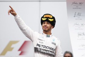 Hamilton celebrates after Sochi win. An FIA image