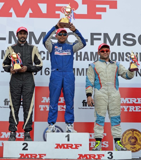 Deepak Paul Chinnappa (centre), winner of the Indian Touring Cars race flanked by Arjun Narendran (left) who finished and second and third placed Ashish Ramaswamy (July 17)