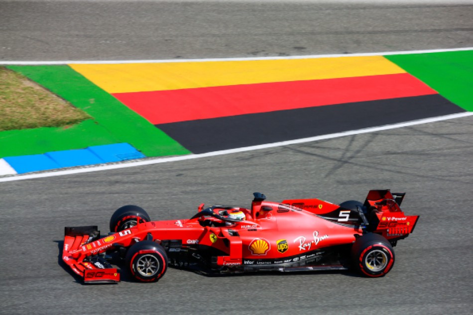 Photo of Sebastian Vettel tops FP1 at home race