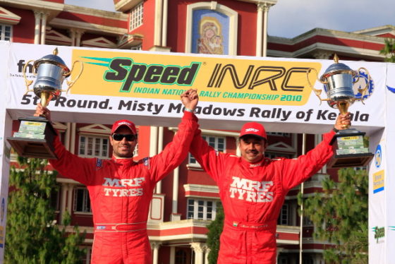 Gaurav Gill, left, and co-driver Musa Sherif with the trophies after winning the Misty Meadows rally on Sunday. An INDIAinF1 image