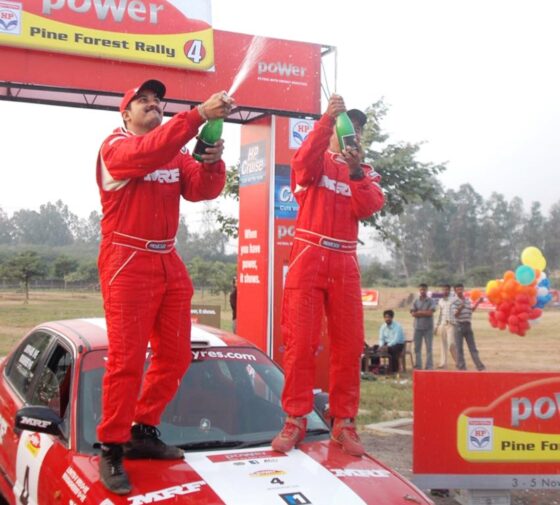 Lohitt Urs and Musa Sherif (right) celebrate after winning the Pine Forest Rally.